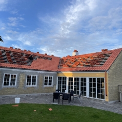 Renovering af tag med røde tagsten